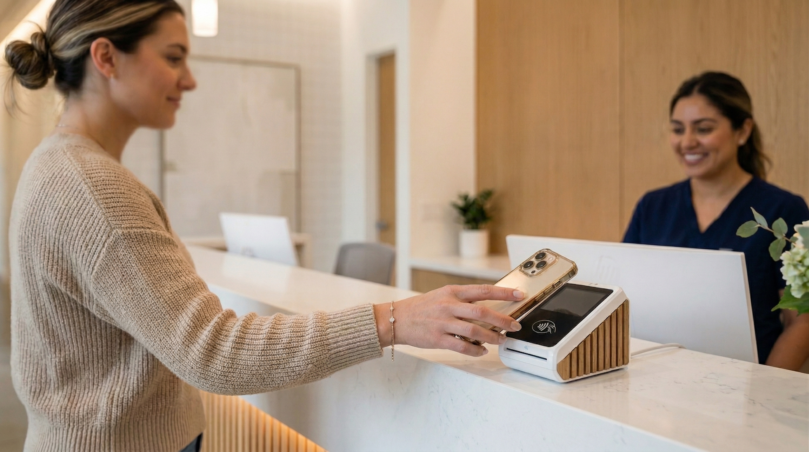 Patient paying at dental office checkout