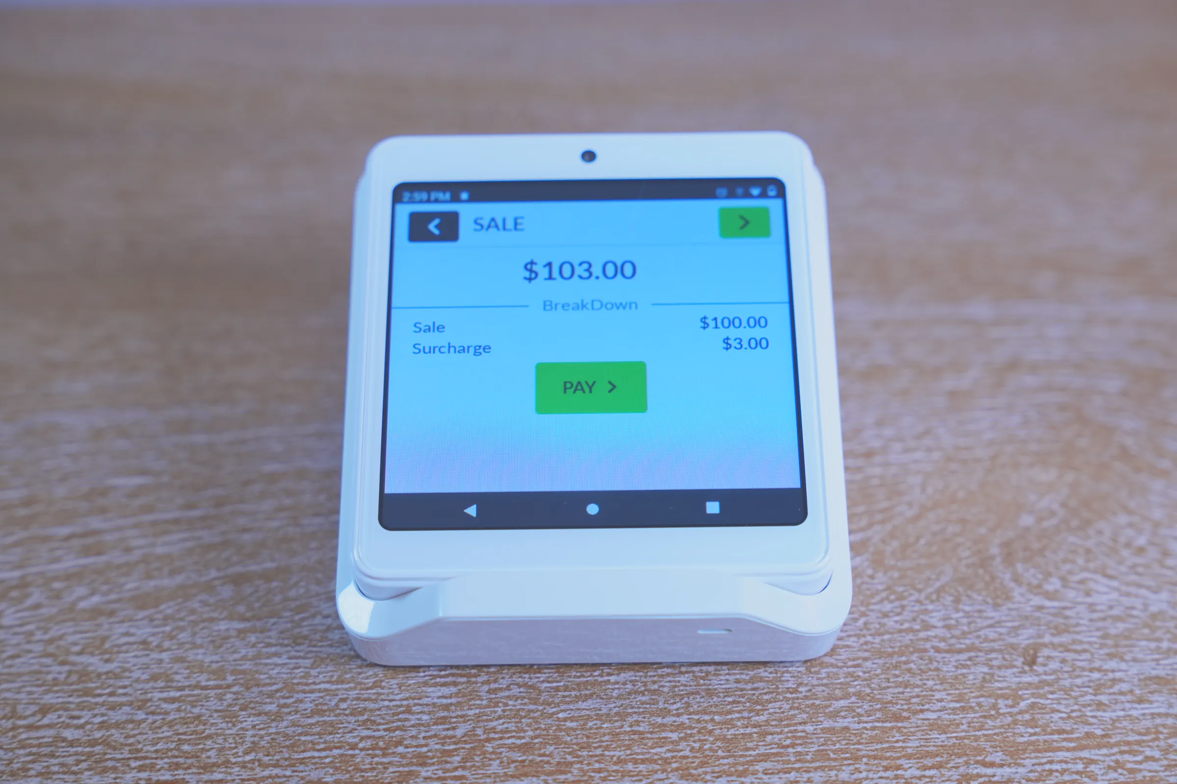 A Summit P12 terminal showing a $103.00 sale with a $3.00 fee on its own line.